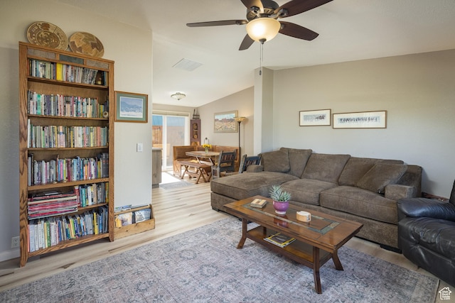 460 E Bowen Cir, Moab, UT 84532 - living room with wood finished floors, a ceiling fan, and vaulted ceiling