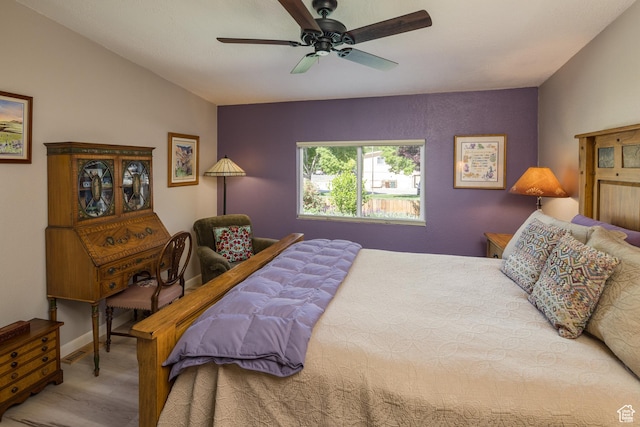 460 E Bowen Cir, Moab, UT 84532 - bedroom with wood finished floors and a ceiling fan