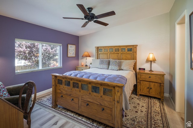 460 E Bowen Cir, Moab, UT 84532 - bedroom with light wood-style flooring and a ceiling fan