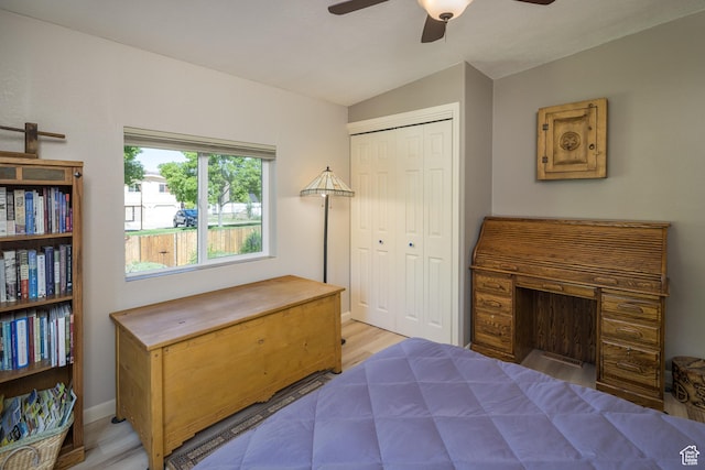 460 E Bowen Cir, Moab, UT 84532 - bedroom with vaulted ceiling, a closet, light wood-style floors, and a ceiling fan