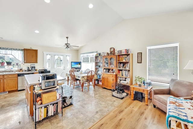 1047 W Ascot Dr N, North Salt Lake, UT 84054 - living area with lofted ceiling, ceiling fan, light wood-type flooring, and recessed lighting
