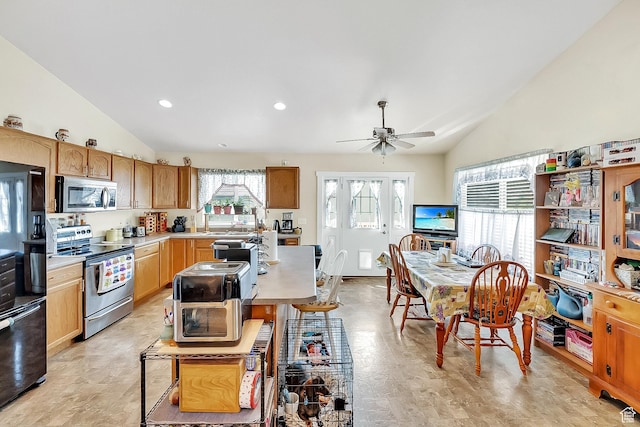 1047 W Ascot Dr N, North Salt Lake, UT 84054 - kitchen featuring appliances with stainless steel finishes, lofted ceiling, light countertops, ceiling fan, and recessed lighting