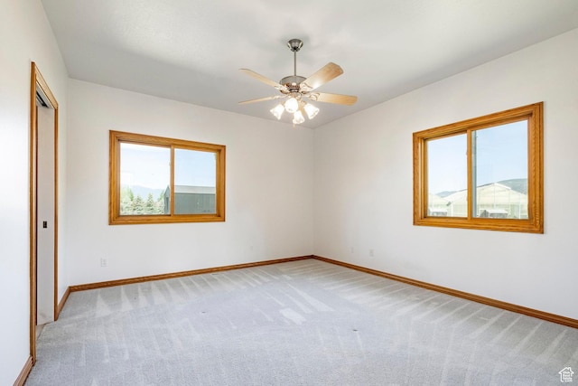 3787 E 1200 S, Heber City, UT 84032 - unfurnished room with healthy amount of natural light, light carpet, and a ceiling fan