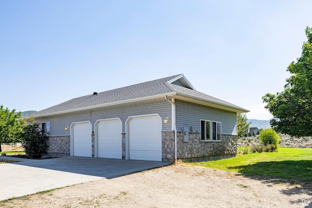 3787 E 1200 S, Heber City, UT 84032 - view of side of home with stone siding, driveway, and roof with shingles