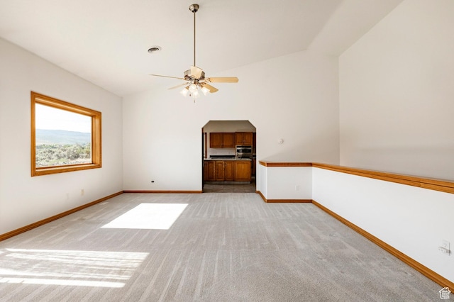 3787 E 1200 S, Heber City, UT 84032 - unfurnished room featuring light colored carpet, vaulted ceiling, and ceiling fan