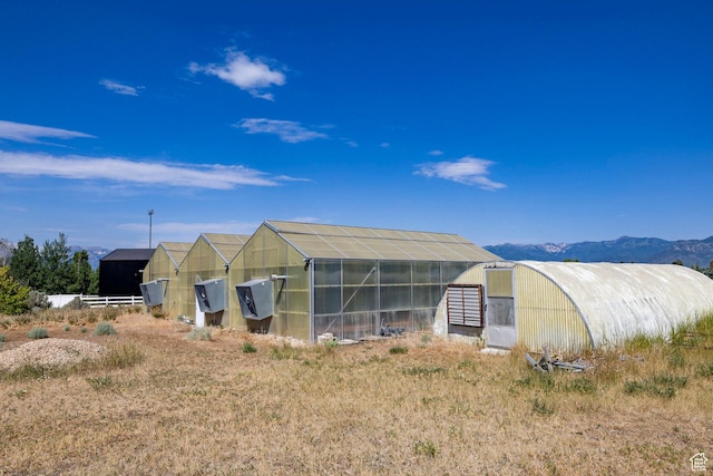 3787 E 1200 S, Heber City, UT 84032 - view of front facade with an exterior structure, an outdoor structure, and a mountain view