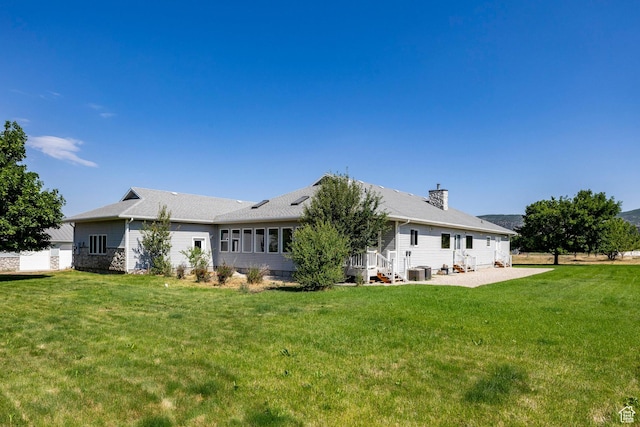 3787 E 1200 S, Heber City, UT 84032 - back of house with a yard, a chimney, and a patio