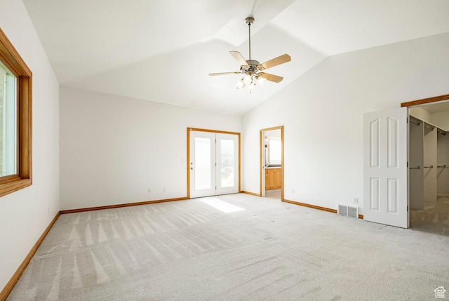 3787 E 1200 S, Heber City, UT 84032 - unfurnished bedroom with vaulted ceiling, light colored carpet, and a ceiling fan