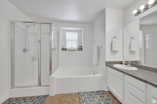 874 W Steeple Chase Dr, Kaysville, UT 84037 - full bath featuring a shower stall, vanity, a garden tub, and tile patterned flooring
