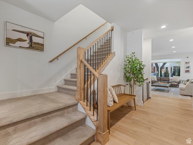 1783 E Bermondsey Ct, Holladay, UT 84117 - staircase featuring wood finished floors and recessed lighting