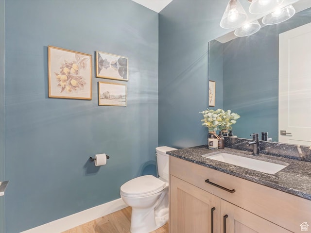 1783 E Bermondsey Ct, Holladay, UT 84117 - bathroom featuring wood finished floors and vanity