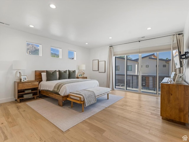 1783 E Bermondsey Ct, Holladay, UT 84117 - bedroom with access to exterior, light wood-type flooring, recessed lighting, and multiple windows