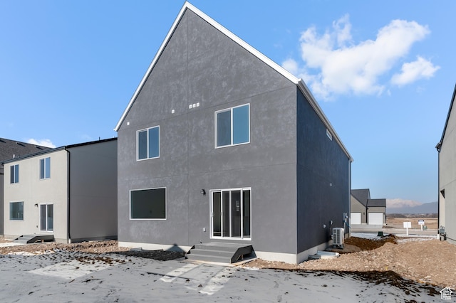 837 N 1860 E Unit 158, Salem, UT 84653 - snow covered rear of property featuring stucco siding and entry steps