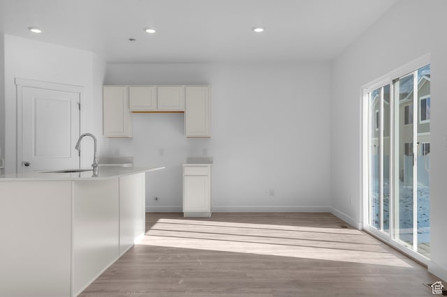 837 N 1860 E Unit 158, Salem, UT 84653 - kitchen featuring light wood finished floors, white cabinetry, and recessed lighting