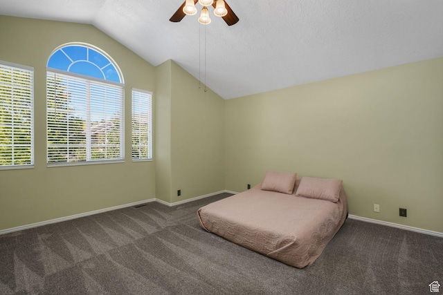 823 Creek Ln, Farmington, UT 84025 - carpeted bedroom with vaulted ceiling, multiple windows, and ceiling fan