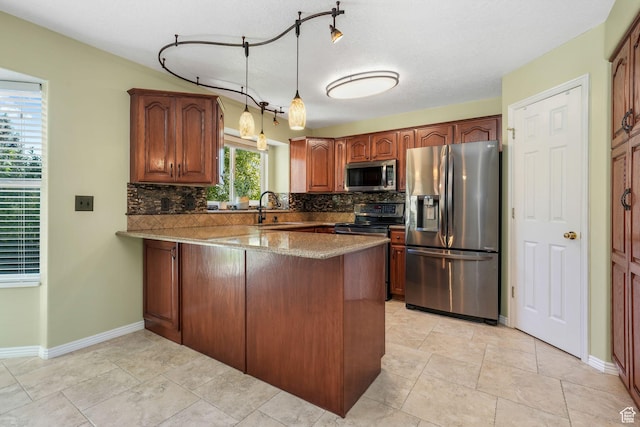 823 Creek Ln, Farmington, UT 84025 - kitchen with stainless steel appliances, a peninsula, backsplash, decorative light fixtures, and stone counters