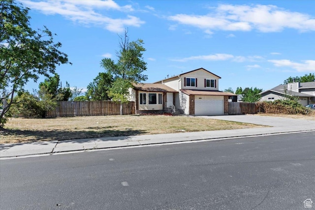 3221 W 6920 S, West Jordan, UT 84084 - traditional-style home with a garage, driveway, and brick siding