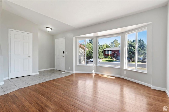 3221 W 6920 S, West Jordan, UT 84084 - foyer entrance featuring light wood-style flooring and baseboards
