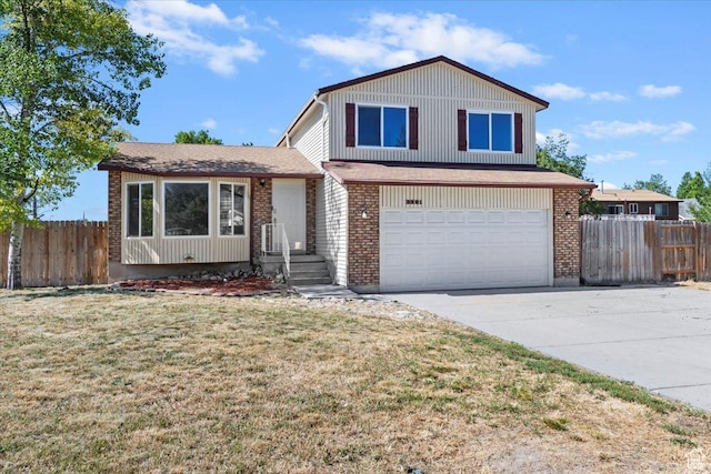 3221 W 6920 S, West Jordan, UT 84084 - view of front of home featuring an attached garage and concrete driveway