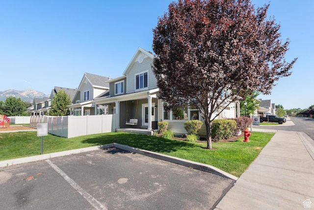 7873 S Farm House Ln E, Midvale, UT 84047 - view of front of home featuring uncovered parking and a residential view