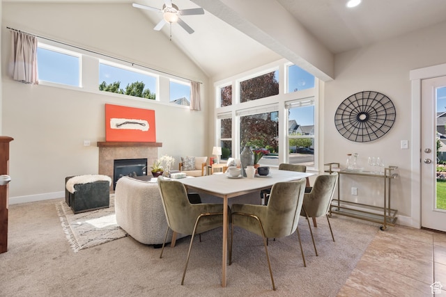 7873 S Farm House Ln E, Midvale, UT 84047 - dining room with a tile fireplace, high vaulted ceiling, and a ceiling fan