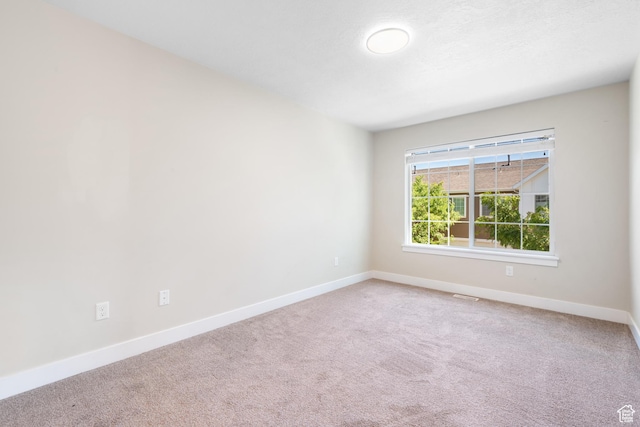 7873 S Farm House Ln E, Midvale, UT 84047 - carpeted empty room with baseboards