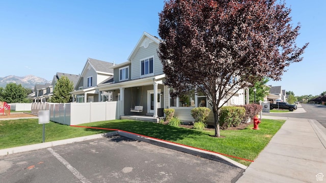 7873 S Farm House Ln E, Midvale, UT 84047 - view of front of home with uncovered parking and a residential view