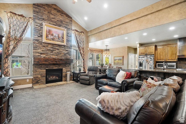 3695 S 3525 W, West Haven, UT 84401 - carpeted living room with high vaulted ceiling, plenty of natural light, a fireplace, recessed lighting, and ceiling fan