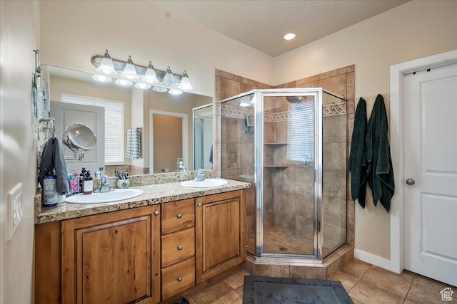 3695 S 3525 W, West Haven, UT 84401 - full bathroom featuring a stall shower, double vanity, and tile patterned flooring