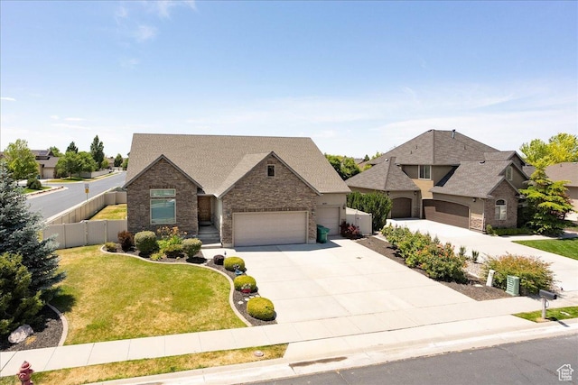 3695 S 3525 W, West Haven, UT 84401 - view of front of house featuring driveway, a garage, stone siding, and a shingled roof