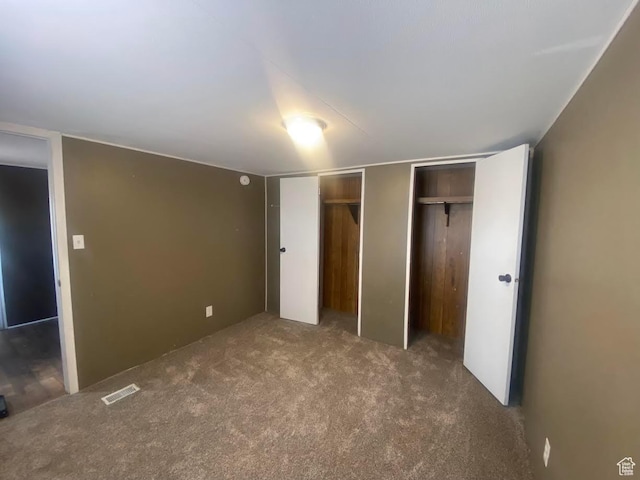 313 E 800 N, Duchesne, UT 84021 - unfurnished bedroom with two closets and carpet floors