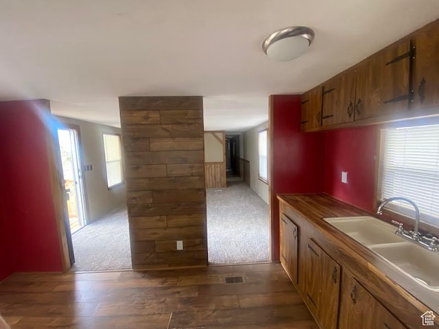 313 E 800 N, Duchesne, UT 84021 - kitchen with brown cabinets, dark wood-style floors, and open floor plan