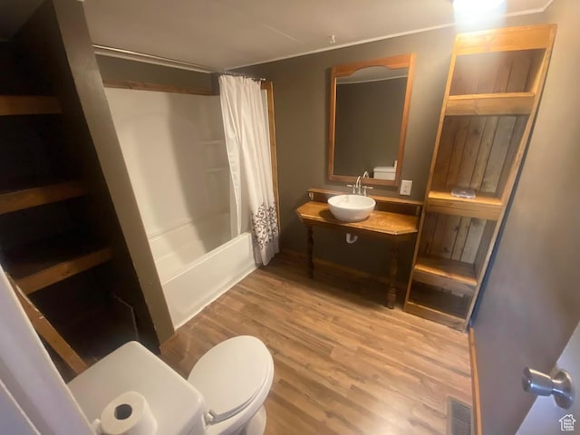 313 E 800 N, Duchesne, UT 84021 - bathroom with shower / bath combo, wood finished floors, and vanity
