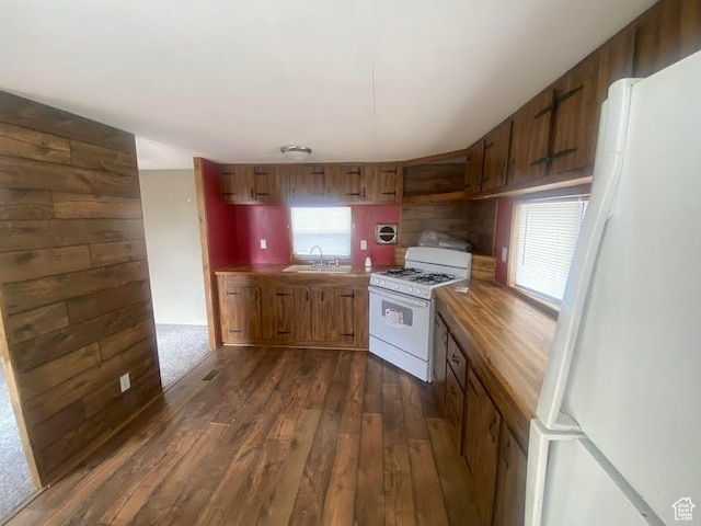 313 E 800 N, Duchesne, UT 84021 - kitchen with white appliances, dark wood-style flooring, brown cabinets, and wooden counters