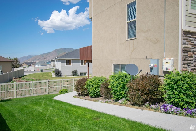 1233 E Upland Dr S Unit 112, Tooele, UT 84074 - view of yard featuring a mountain view and a residential view