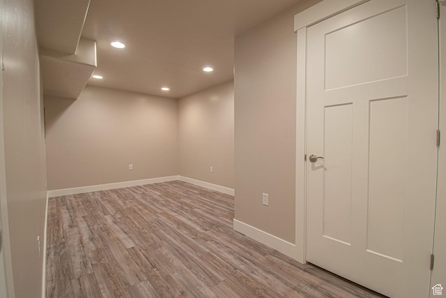 1233 E Upland Dr S Unit 112, Tooele, UT 84074 - below grade area featuring wood finished floors and recessed lighting