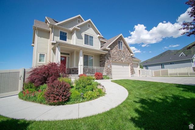 1233 E Upland Dr S Unit 112, Tooele, UT 84074 - craftsman house featuring stone siding and covered porch