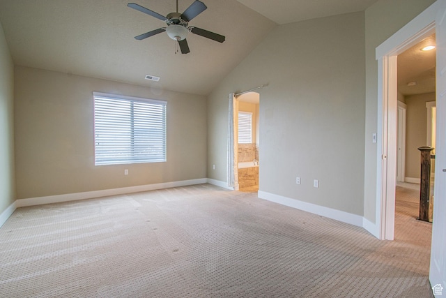 1233 E Upland Dr S Unit 112, Tooele, UT 84074 - unfurnished bedroom with light carpet, lofted ceiling, connected bathroom, and ceiling fan
