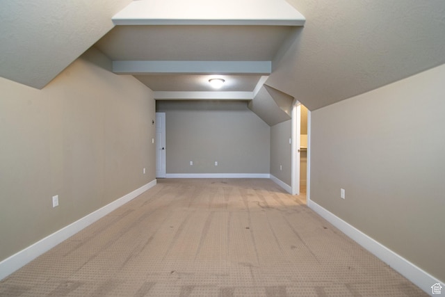 1233 E Upland Dr S Unit 112, Tooele, UT 84074 - additional living space with light colored carpet and lofted ceiling