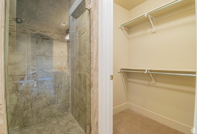 1233 E Upland Dr S Unit 112, Tooele, UT 84074 - bathroom featuring a shower stall and a spacious closet