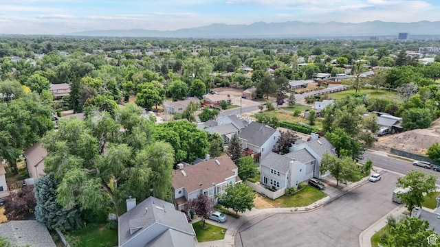 1248 E Freshman Cir, Millcreek, UT 84117 - aerial view of residential area featuring a mountainous background
