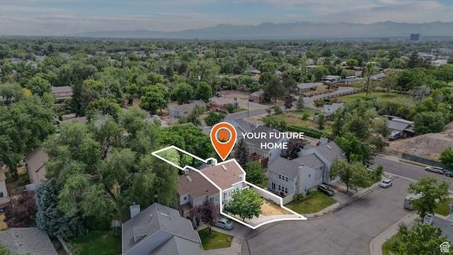 1248 E Freshman Cir, Millcreek, UT 84117 - aerial perspective of suburban area with property boundaries highlighted and mountains