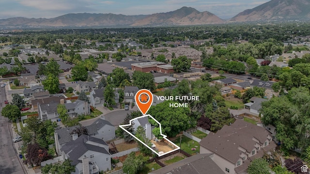 1248 E Freshman Cir, Millcreek, UT 84117 - aerial perspective of suburban area with property parcel outlined and a mountain backdrop