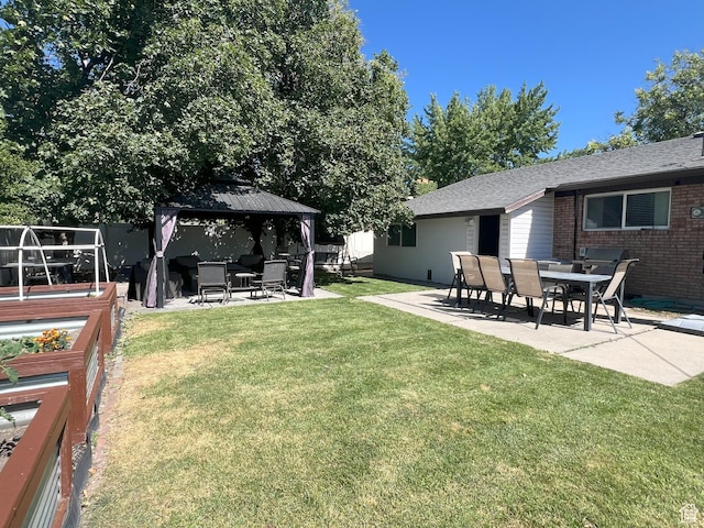 663 E 485 S, Orem, UT 84097 - view of grassy yard featuring a patio area, a gazebo, and a vegetable garden