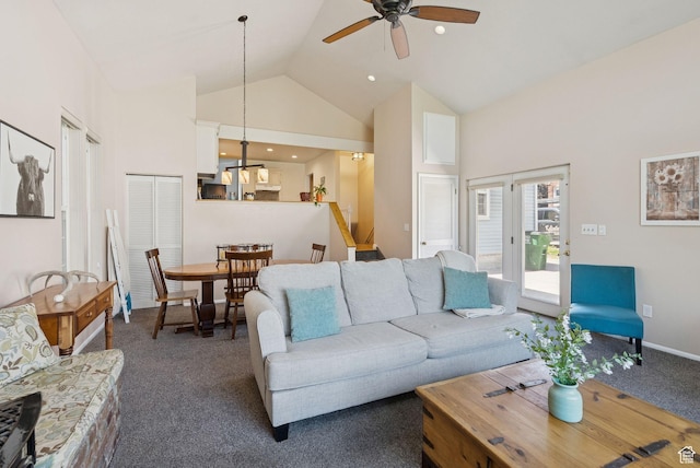 145 S 300 E, Kaysville, UT 84037 - living area with high vaulted ceiling, ceiling fan, and dark colored carpet
