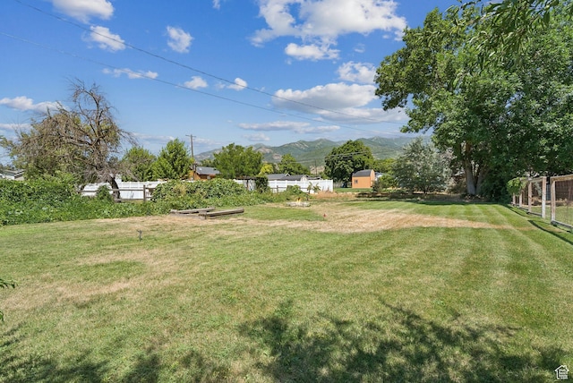 145 S 300 E, Kaysville, UT 84037 - view of yard featuring a mountain view and a vegetable garden