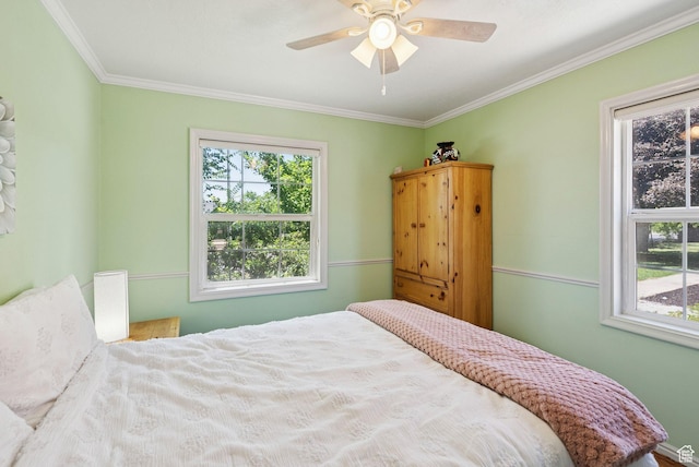 145 S 300 E, Kaysville, UT 84037 - bedroom with multiple windows, crown molding, and ceiling fan