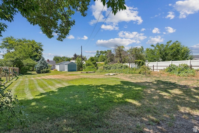 145 S 300 E, Kaysville, UT 84037 - view of yard featuring a storage shed