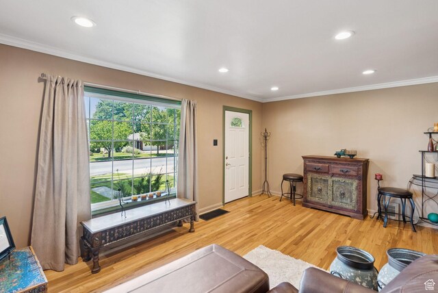 145 S 300 E, Kaysville, UT 84037 - living room featuring ornamental molding, recessed lighting, and wood finished floors