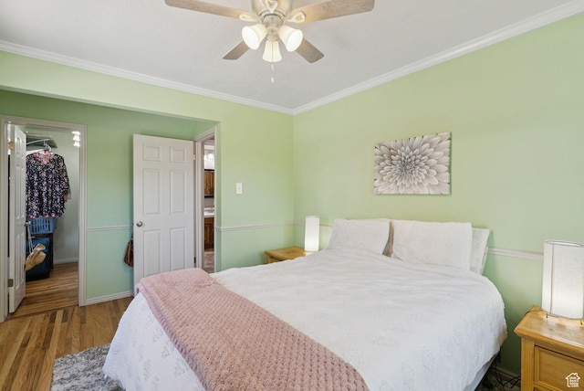 145 S 300 E, Kaysville, UT 84037 - bedroom featuring wood finished floors, ornamental molding, and ceiling fan